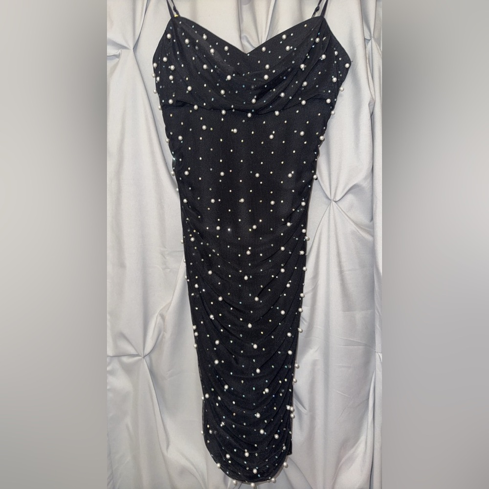 Black dress with pearls and sparkles NEVER worn and it has been dry cleaned